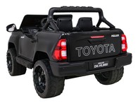 Toyota Hilux na akumulator dla dzieci Czarny + Napęd 4x4 + Pilot + 2 bagażniki + Radio MP3 + LED